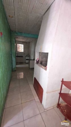 Terreno com 02 casas no loteamento Jardim Imperial  
