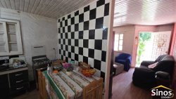 Terreno com 02 casas no loteamento Jardim Imperial  