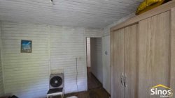 Terreno com 02 casas no loteamento Jardim Imperial  