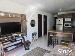 Terreno com 02 casas no bairro Lomba Grande 