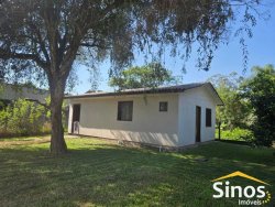 Terreno com 02 casas no bairro Lomba Grande 