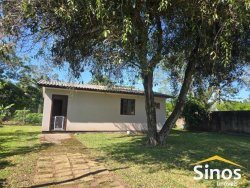 Terreno com 02 casas no bairro Lomba Grande 