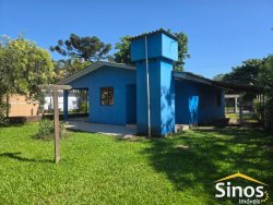 Terreno com 02 casas no bairro Lomba Grande 
