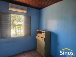 Terreno com 02 casas no bairro Lomba Grande 