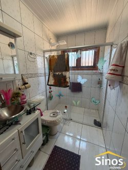 Casa com 02 dormitórios no Centro   