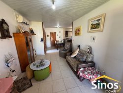 Casa com 02 dormitórios no Centro   