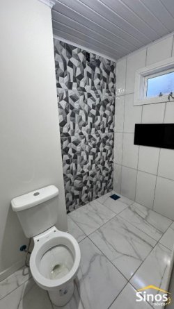 Casa com 02 dormitórios e uma suíte no bairro Canudos  