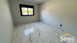 Casa com 02 dormitórios e uma suíte no bairro Canudos  