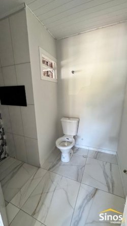 Casa com 02 dormitórios e uma suíte no bairro Canudos  