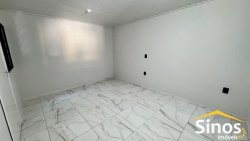Casa com 02 dormitórios e uma suíte no bairro Canudos  
