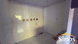 Casa com 03 dormitórios para locação no bairro Primavera  