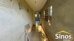 Casa com 03 dormitórios para locação no bairro Primavera  