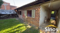 Casa com 03 dormitórios para locação no bairro Primavera  