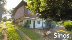 Casa com 03 dormitórios para locação no bairro Primavera  
