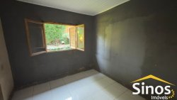 Casa com 03 dormitórios para locação no bairro Primavera  