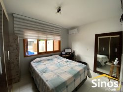Casa com 02 dormitórios, sendo 01 suíte para locação no bairro Lomba Grande      