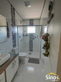 Casa com 03 dormitórios, sendo 01 suite no bairro Petrópolis  
