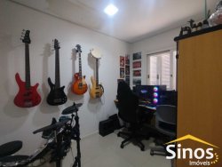 Casa com 03 dormitórios, sendo 01 suite no bairro Petrópolis  