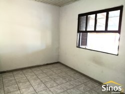 Casa com 03 dormitórios no bairro Scharlau 