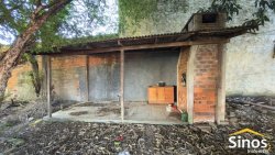 Terreno com casa antiga no bairro Canudos 