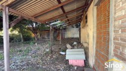 Terreno com casa antiga no bairro Canudos 