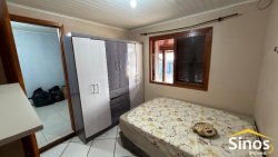 Casa com 03 dormitórios (01 suíte) no bairro Lomba Grande 