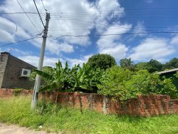 Terreno de 429m² com construção no bairro Jardim Mauá 