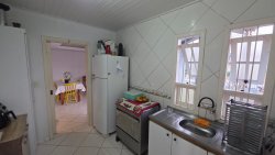 Terreno com 02 casas amplas no bairro Encosta do Sol 
