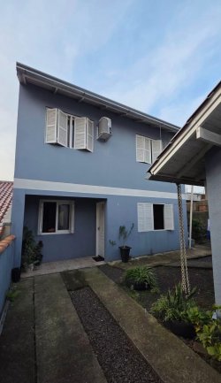 Terreno com 02 casas amplas no bairro Encosta do Sol 
