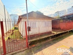 Terreno com construção no bairro Vila Rosa 