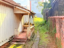 Terreno com construção no bairro Vila Rosa 