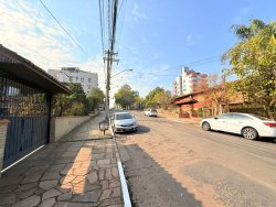 Terreno com construção no bairro Vila Rosa 