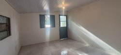 Terreno de esquina com construção no bairro Santo Afonso 