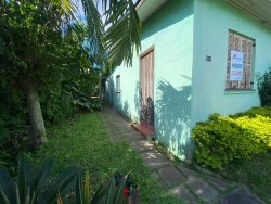 Terreno com construção no bairro Rio Branco 