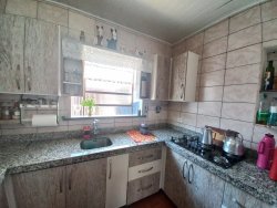 Terreno com peça comercial e residencial no bairro Feitoria 