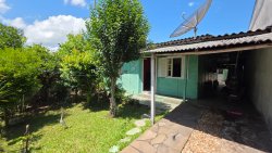 Terreno com 02 casas no loteamento Jardim Imperial 