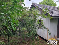 Terreno com casa na área central de Lomba Grande