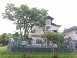 Terreno com 03 casas com 03 dormitórios no Bairro Rio Branco