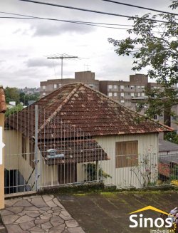Terreno com casa mista no bairro Ouro Branco
