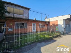 Terreno com prédio comercial e residencial no bairro Ideal