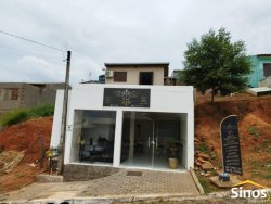 Casa com sala comercial no bairro Boa Saúde 
