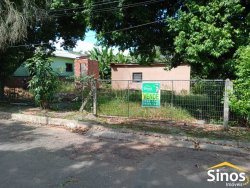 Terreno com construção no bairro Guarani
