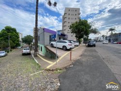 Terreno de esquina com prédio comercial no bairro Pátria Nova