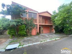 Casa com salas comerciais no bairro Ideal