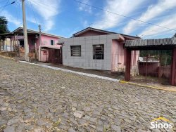 Terreno com 02 casas no bairro Panorâmico