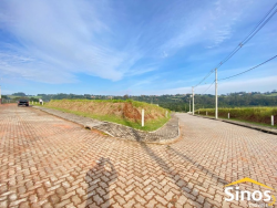 Terreno com 340m² no condomínio Moradas da Lomba