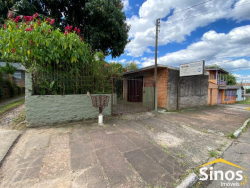 Casa com 05 dormitórios e prédio comercial no bairro Rondônia 