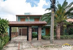 Casa com 05 suítes no bairro Imigrante Norte