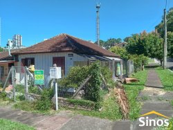 Terreno com chalé no bairro Jardim Mauá