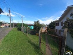 Terreno com construção no bairro Rondônia